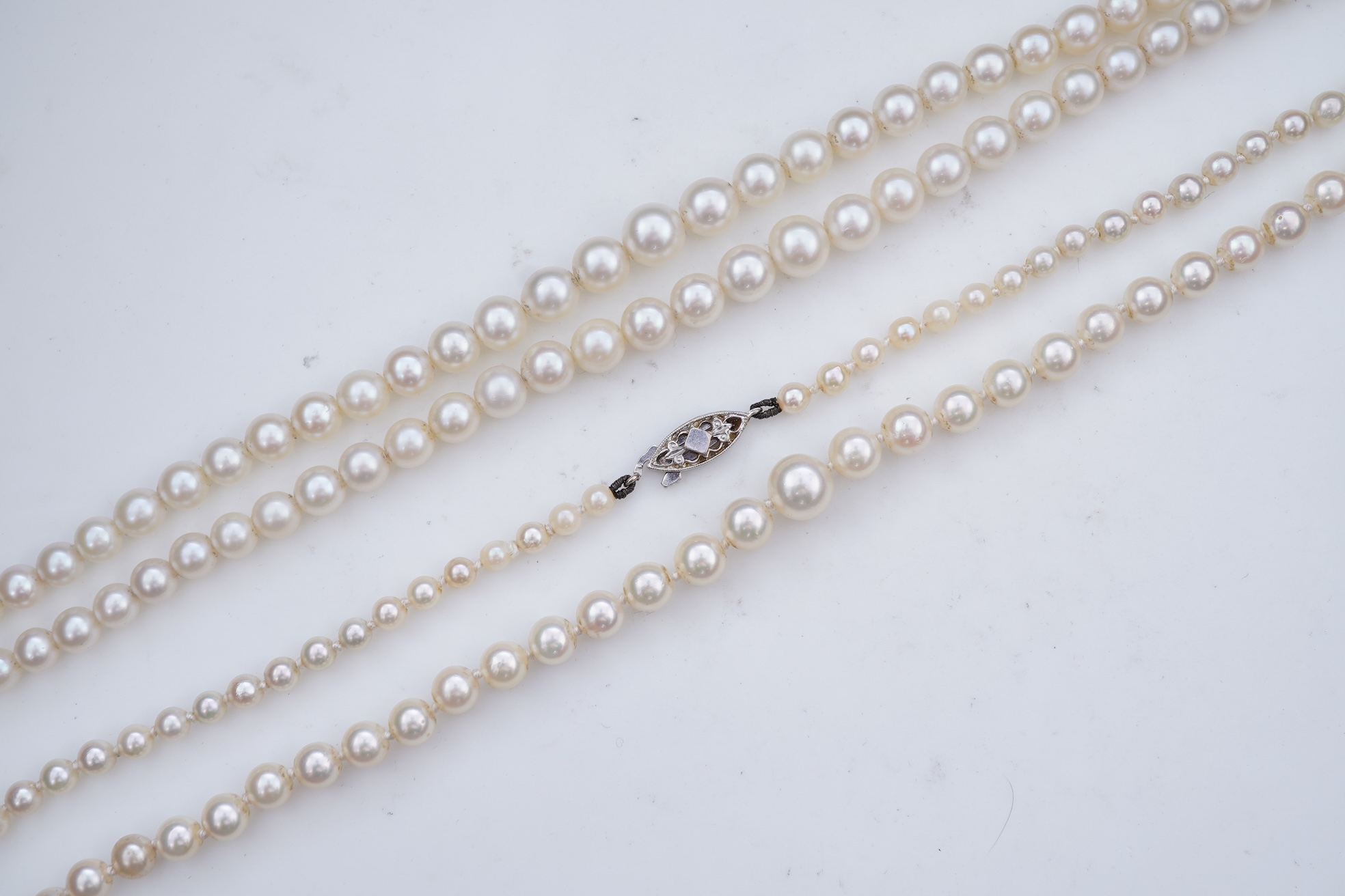 A cultured pearl and diamond necklace, early 20th century